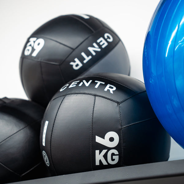 Wall balls on the rack at STR Fitness Club